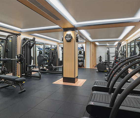 The fitness center at The Little Nell with pelotons and other state of the art equipment.