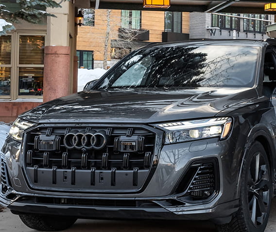 audi car at hotel entrance in winter