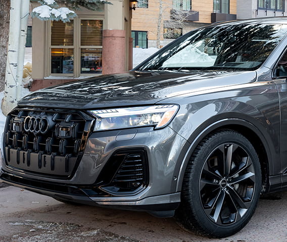 audi in front of hotel in winter