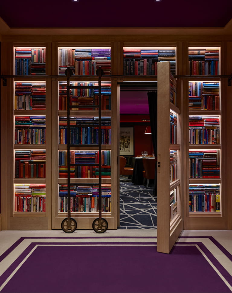 hidden bookshelf entrance to the board room