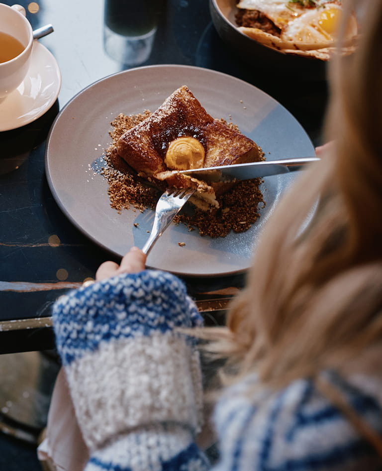 woman eating breakfast