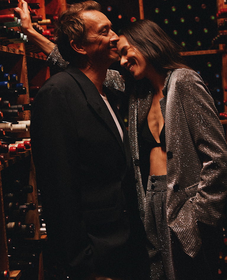couple in wine cellar