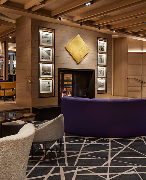 fireplace in lobby lounge area at the little nell