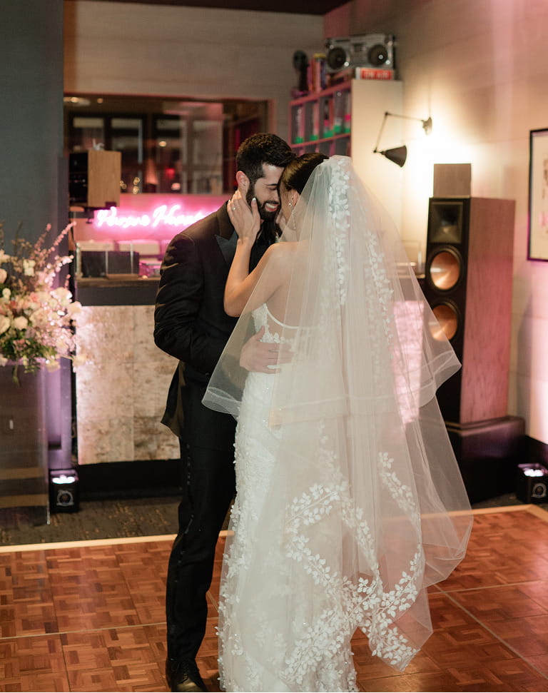 wedding couple dancing in wine bar