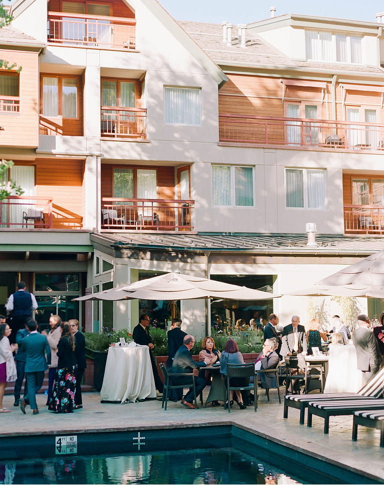 wedding event outside of wine bar next to pool
