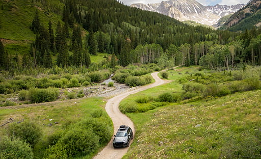 audi suv off-roading through aspen mountains