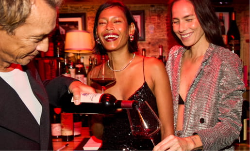 friends in wine cellar